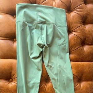 Lululemon Leggings worn once. Size 8. More of a sage green color.